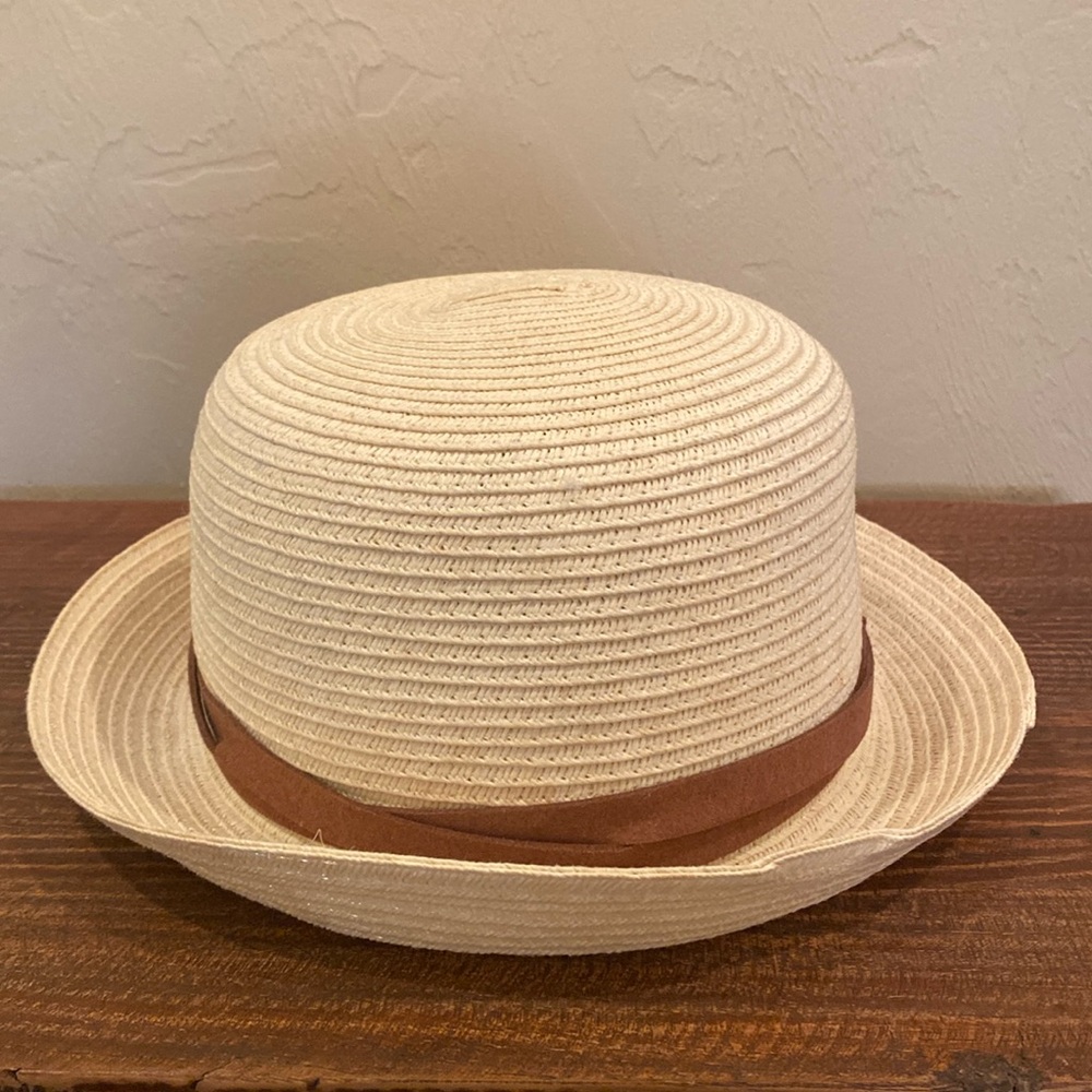Tan summer hat with brown material around top.